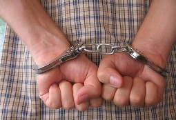 Man w/Handcuffs, Criminal Defense Attorney in Marion, AR